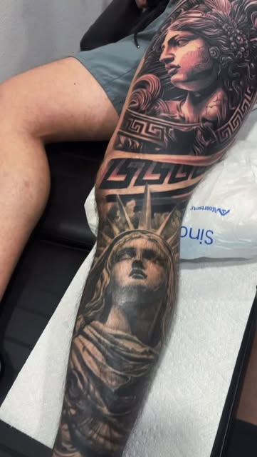 Black and grey sleeve with mythological portrait and Statue of Liberty